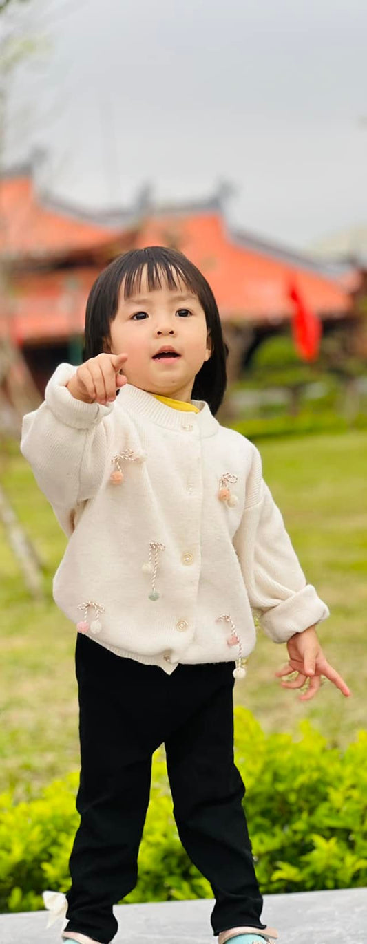 Girls’ Cream Cardigan Sweater – Pastel Pom-Pom Decoration
