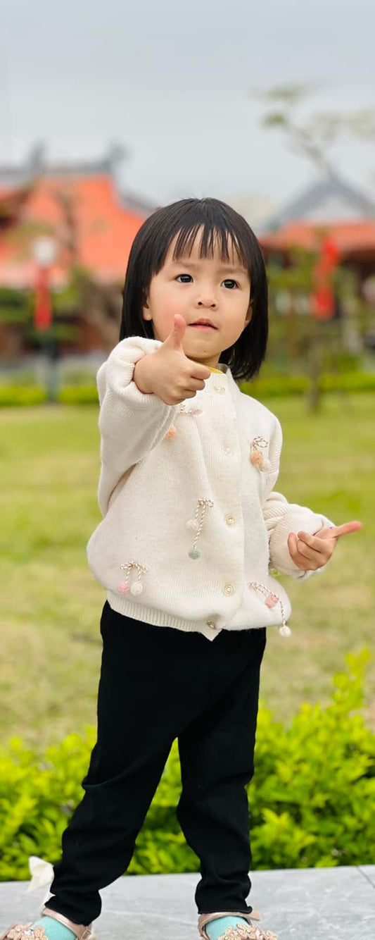 Girls’ Cream Cardigan Sweater – Pastel Pom-Pom Decoration